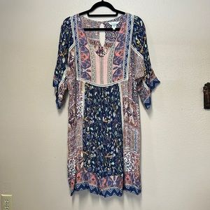 Sundance sun dress. Size large. Comes with a slip/dress lining. Excellent shape.